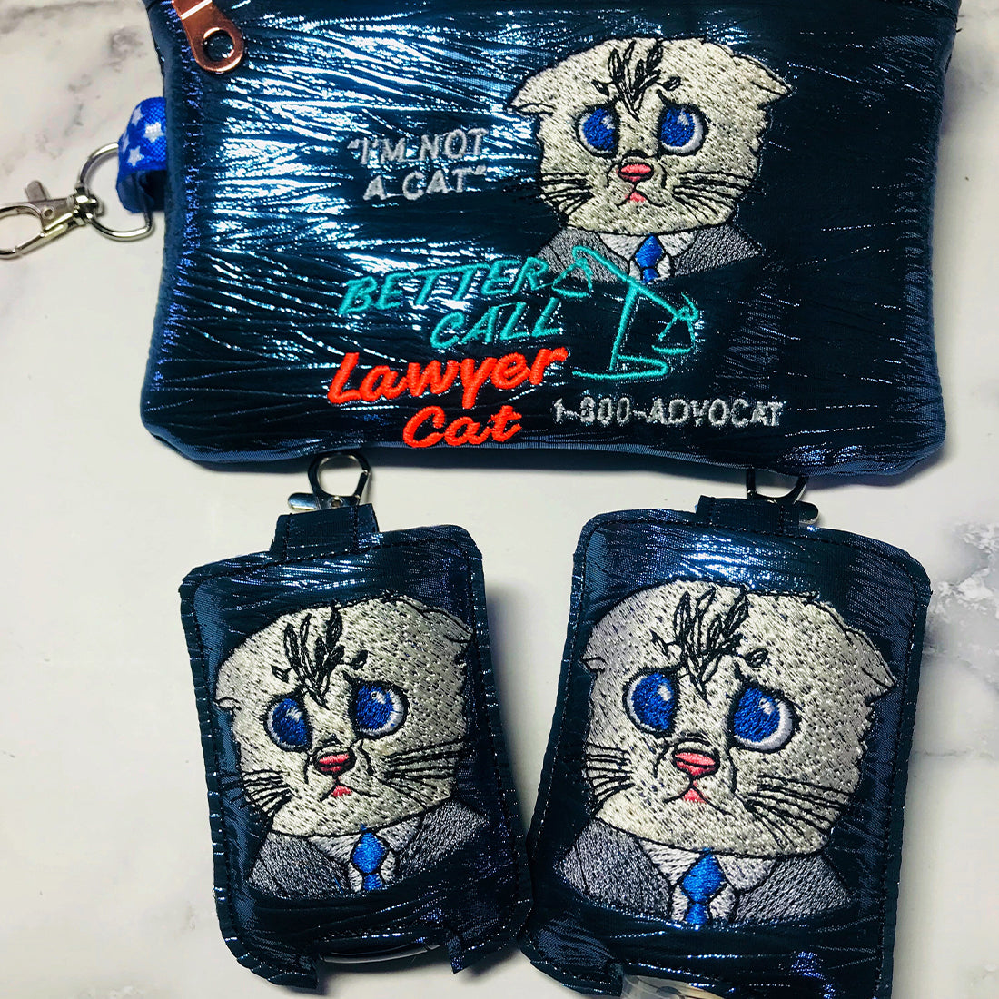 Advocat Embroidery Design & Sanitizer Holder
