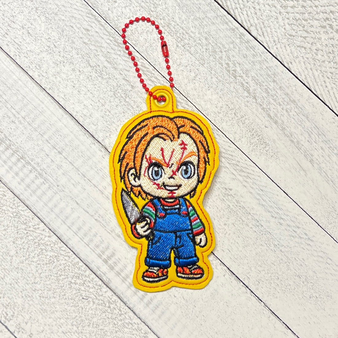 Chucky Snap Tab & Eyelet Fob