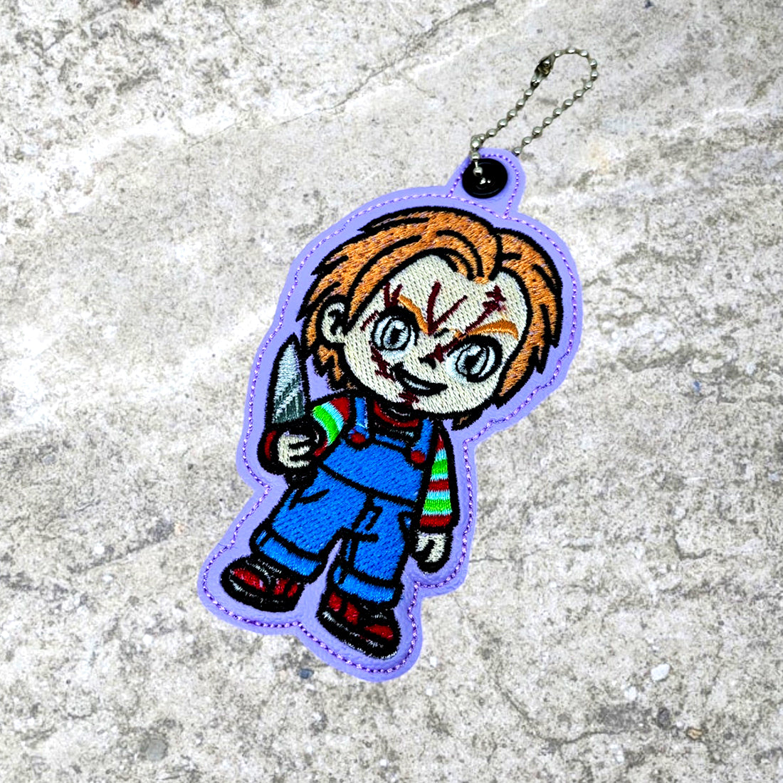 Chucky Snap Tab & Eyelet Fob