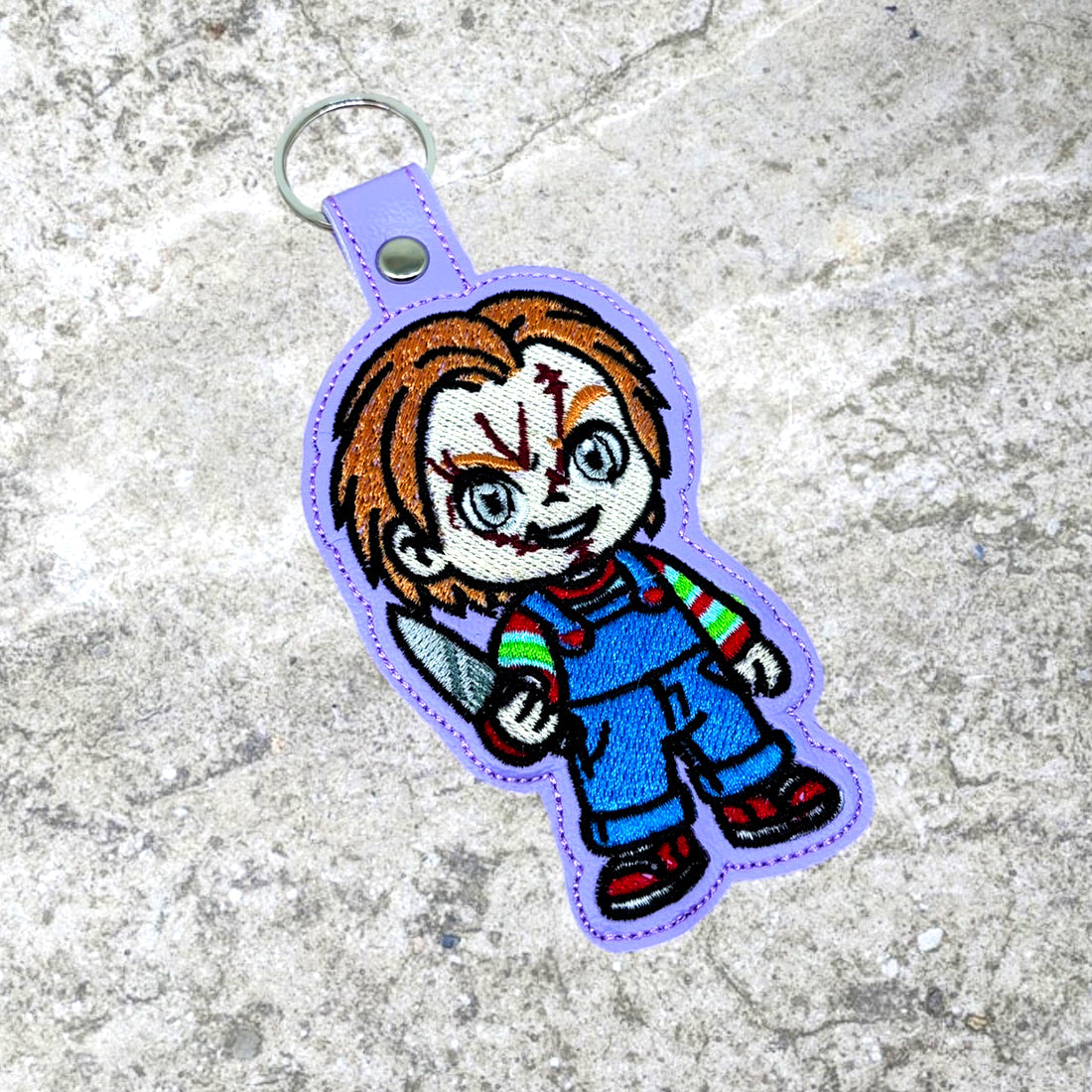 Chucky Snap Tab & Eyelet Fob