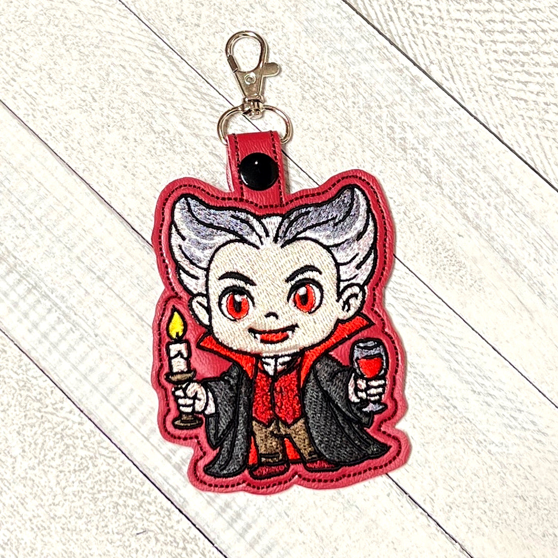 Dracula Snap Tab & Eyelet Fob