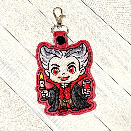 Dracula Snap Tab & Eyelet Fob