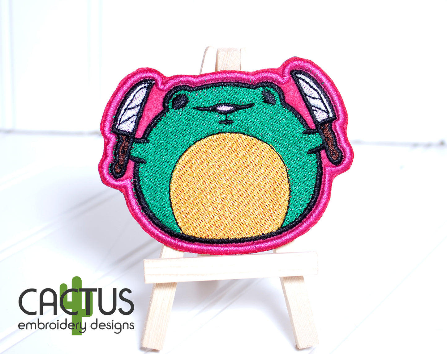 Froge with a Knife Patch Embroidery Design
