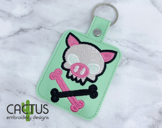 Piggy Crossbones Snap Tab & Eyelet Fob