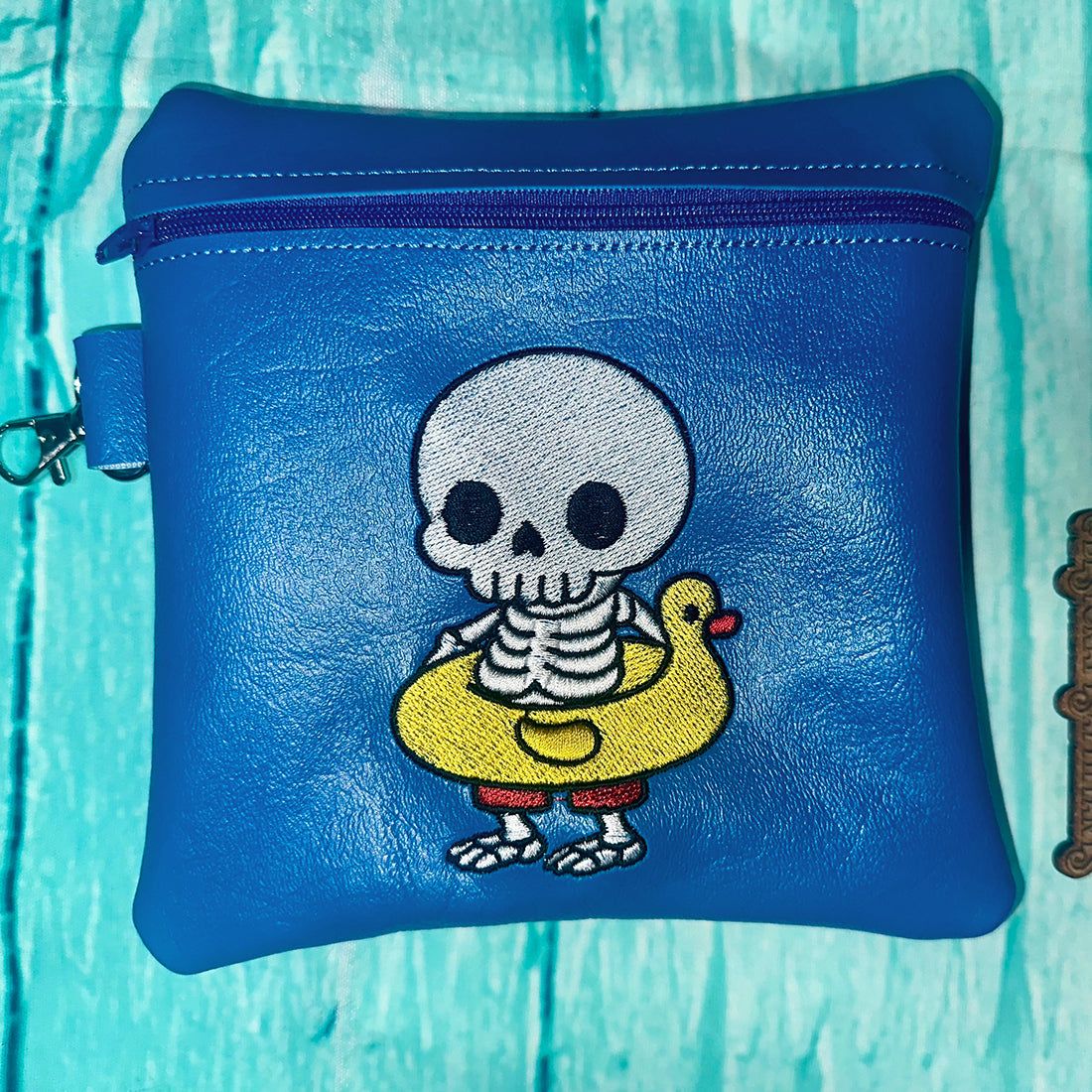 Skeleton in a duck lifebuoy Embroidery Design