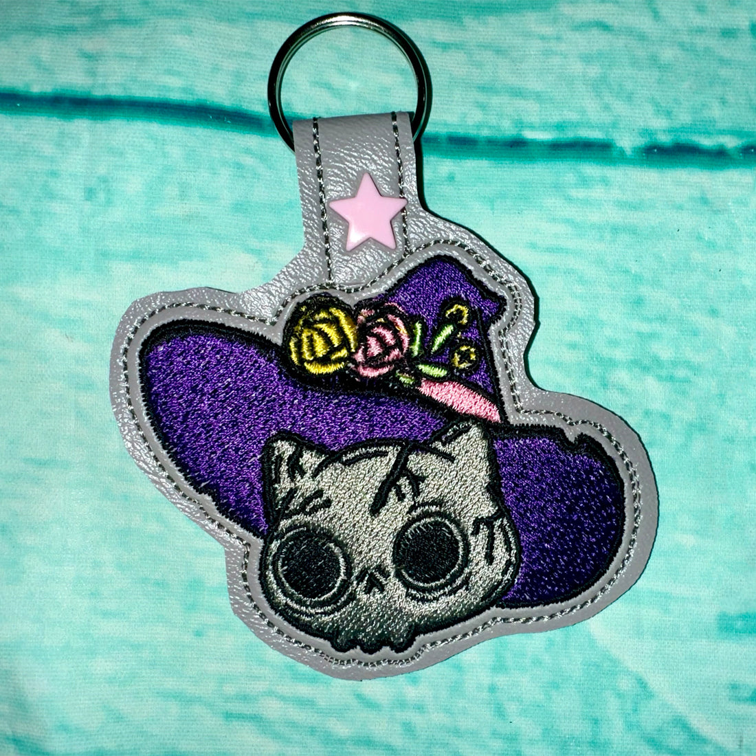 SkullCat in a Hat Snap Tab & Eyelet Fob