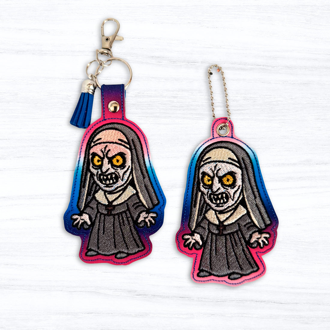 The Nun Snap Tab & Eyelet Fob