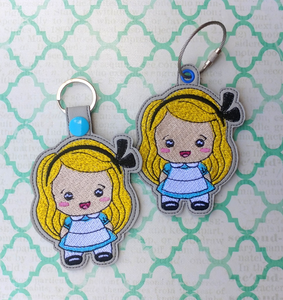 Chibi Ali Snap Tab & Eyelet Fob