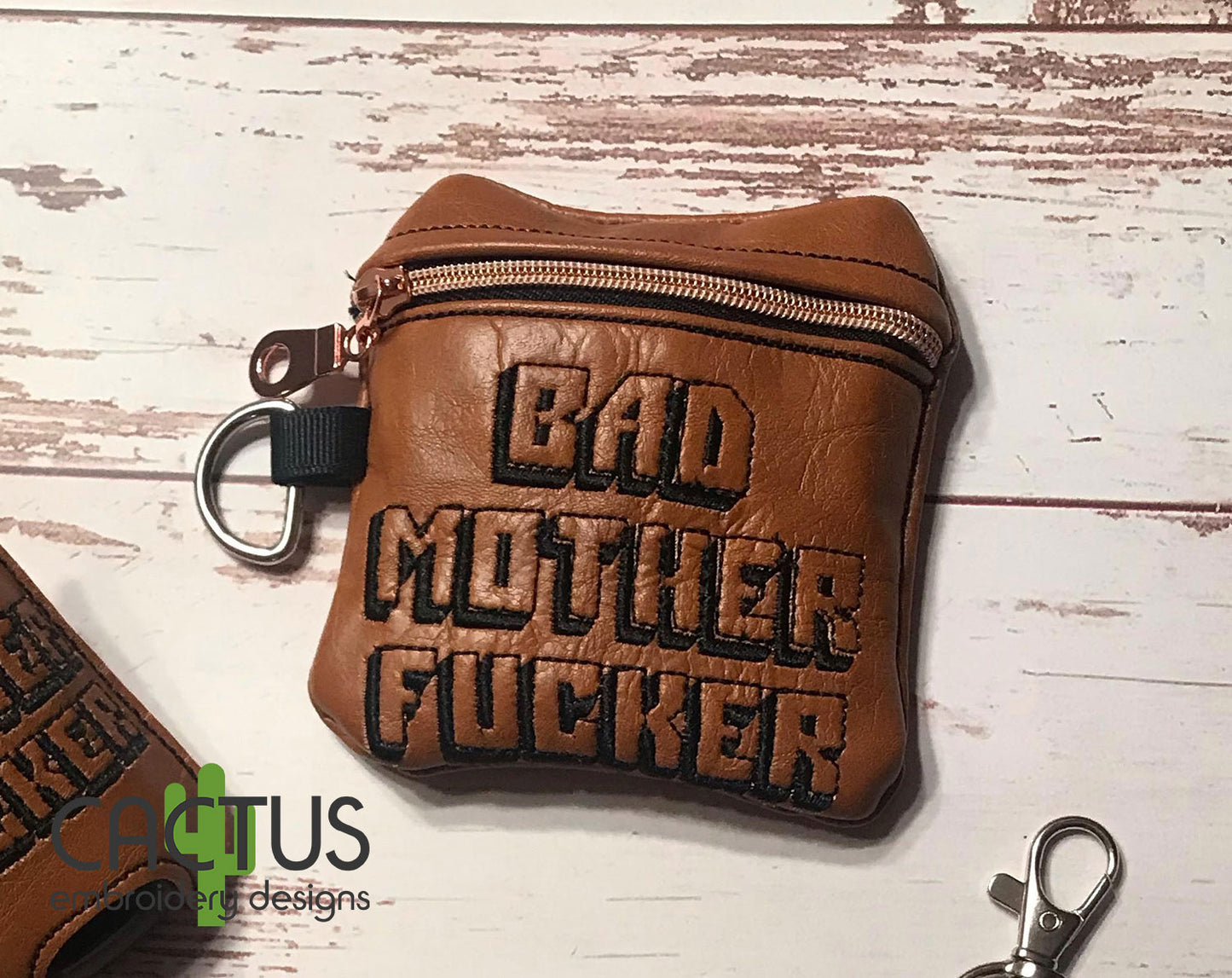 Bad MF Set of Embroidery Design, Eyelet Fob, Snap Tab, Zipper Bag & Sanitizer Holder