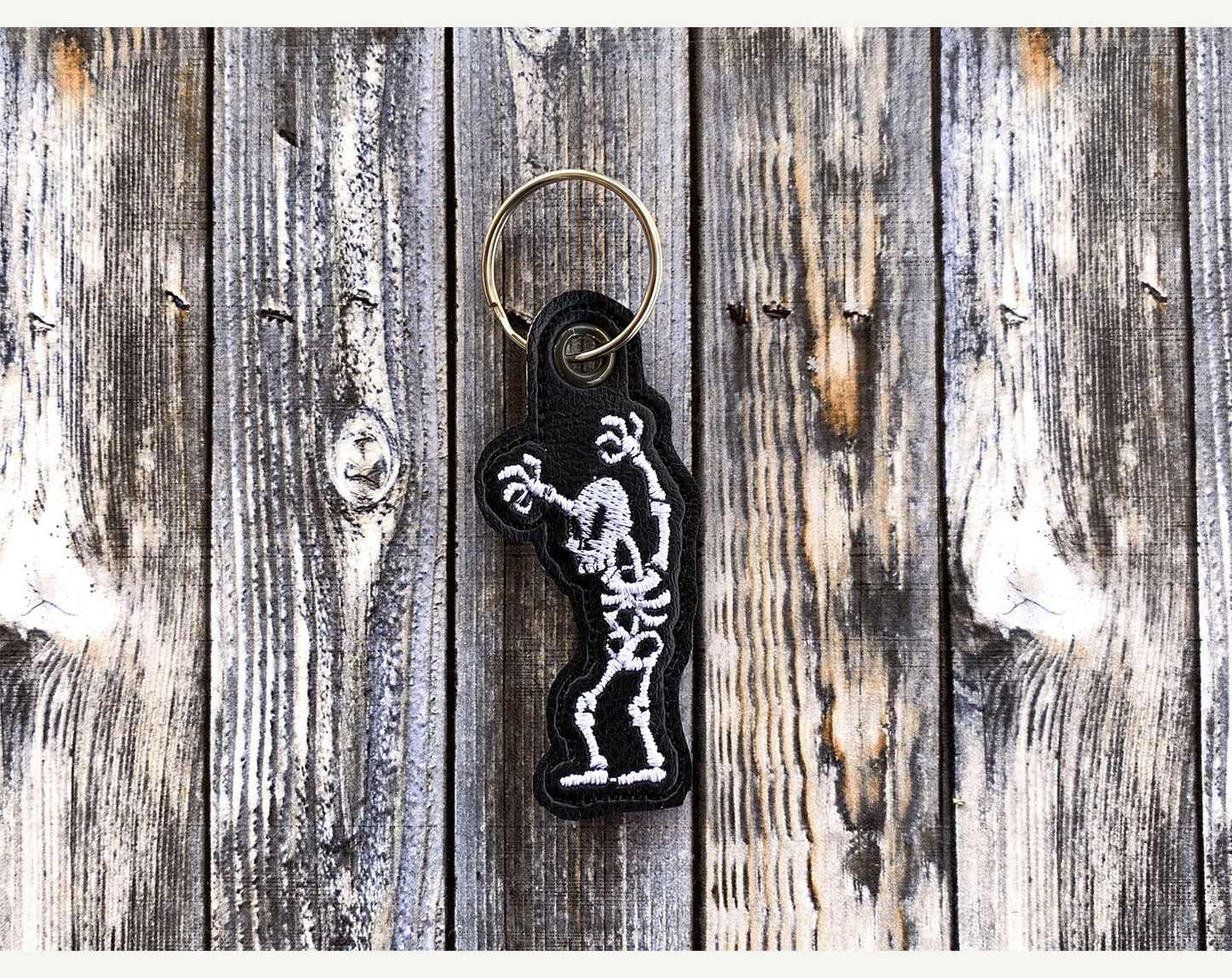 Cute Skeleton Eyelet Fob