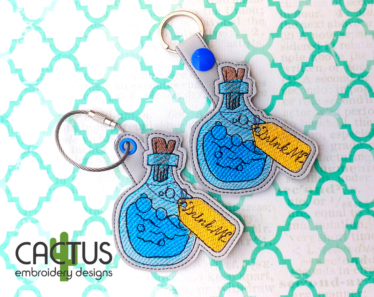 Drink Me Snap Tab & Eyelet Fob