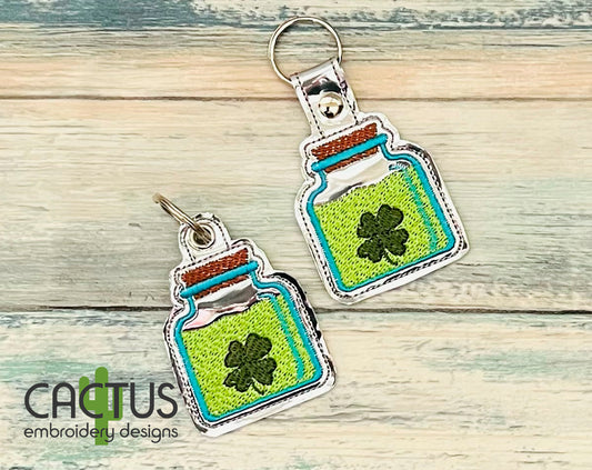 Liquid Luck Snap Tab & Eyelet Fob