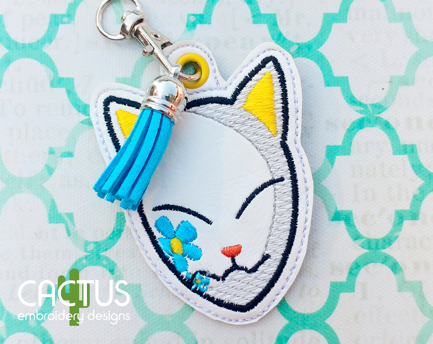 M Mask Snap Tab & Eyelet Fob
