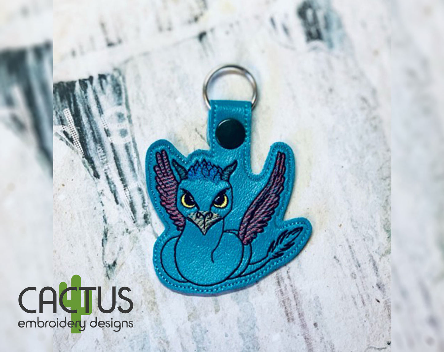 Winged Serpentine Snap Tab