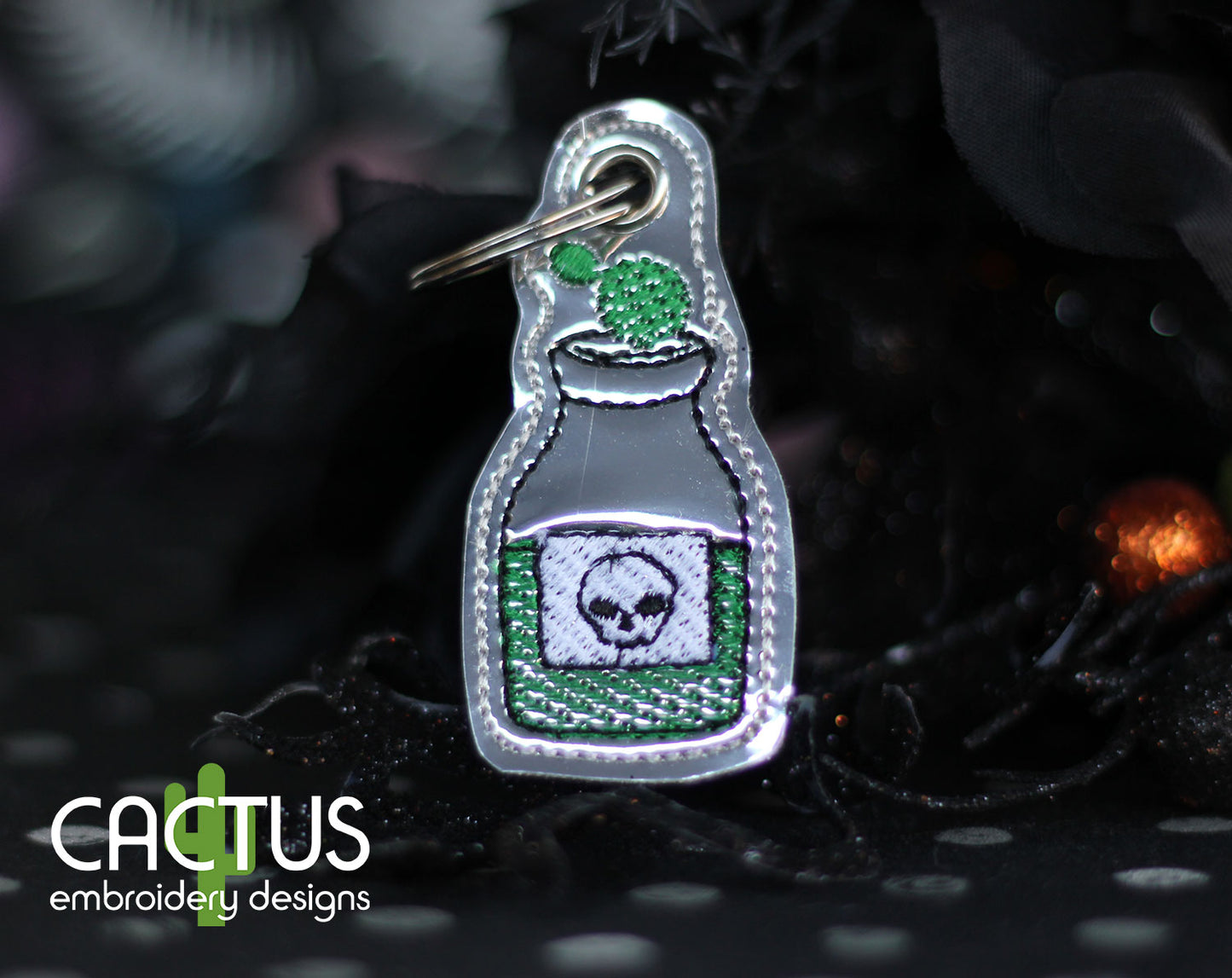 Poison Bottle Eyelet Fob