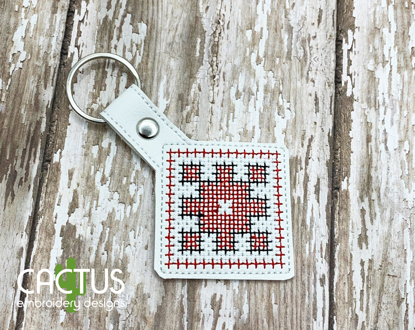 Polissia Snap Tab & Eyelet Fob