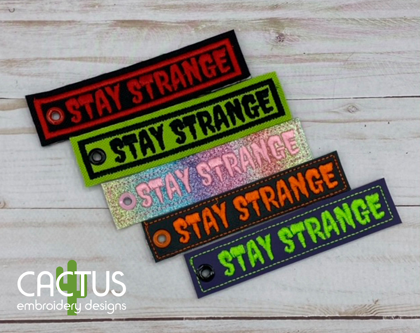 Stay Strange Patch & Eyelet Fob Embroidery Design