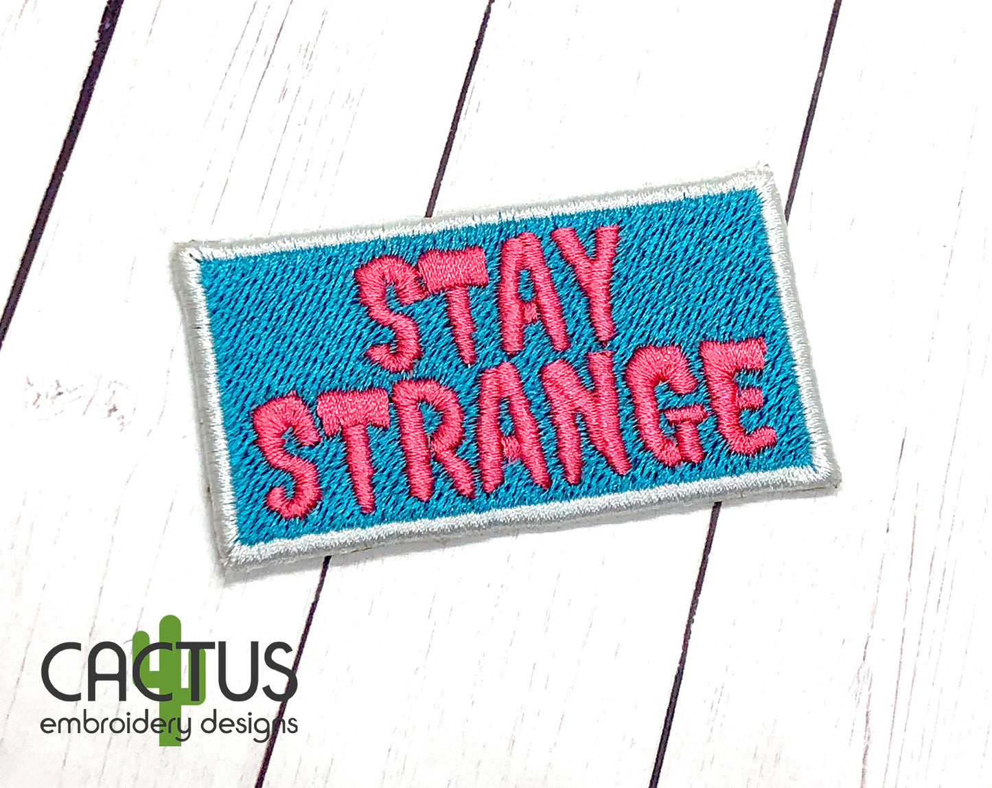 Stay Strange Patch & Eyelet Fob Embroidery Design