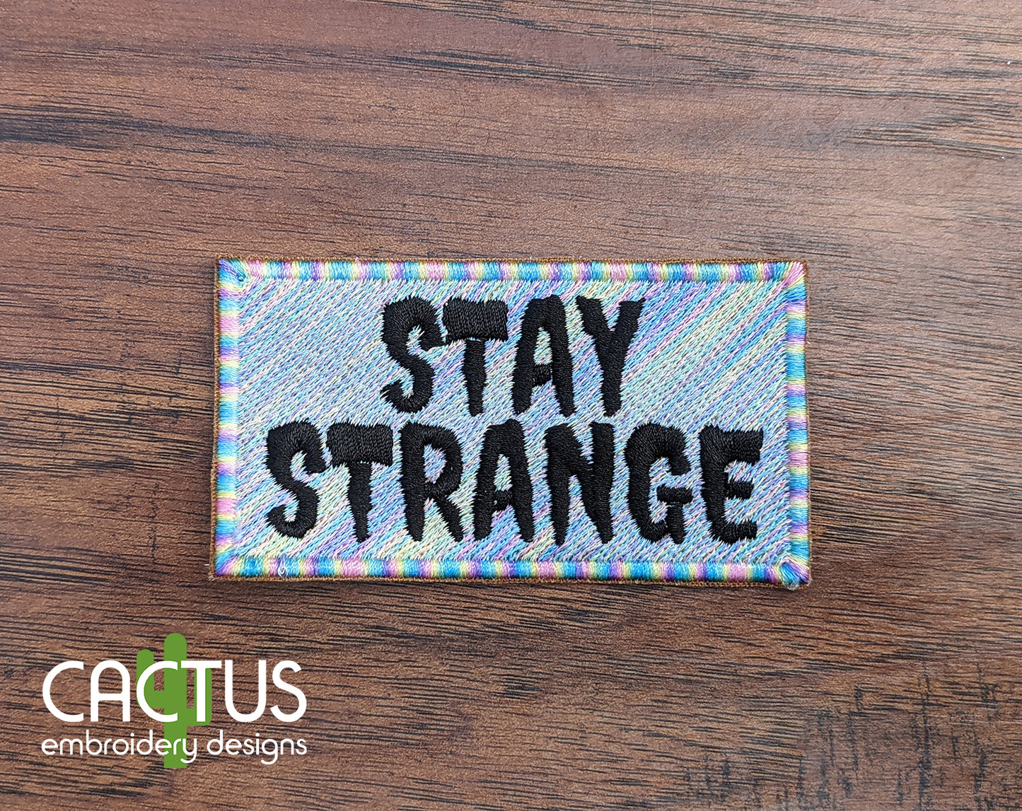 Stay Strange Patch & Eyelet Fob Embroidery Design