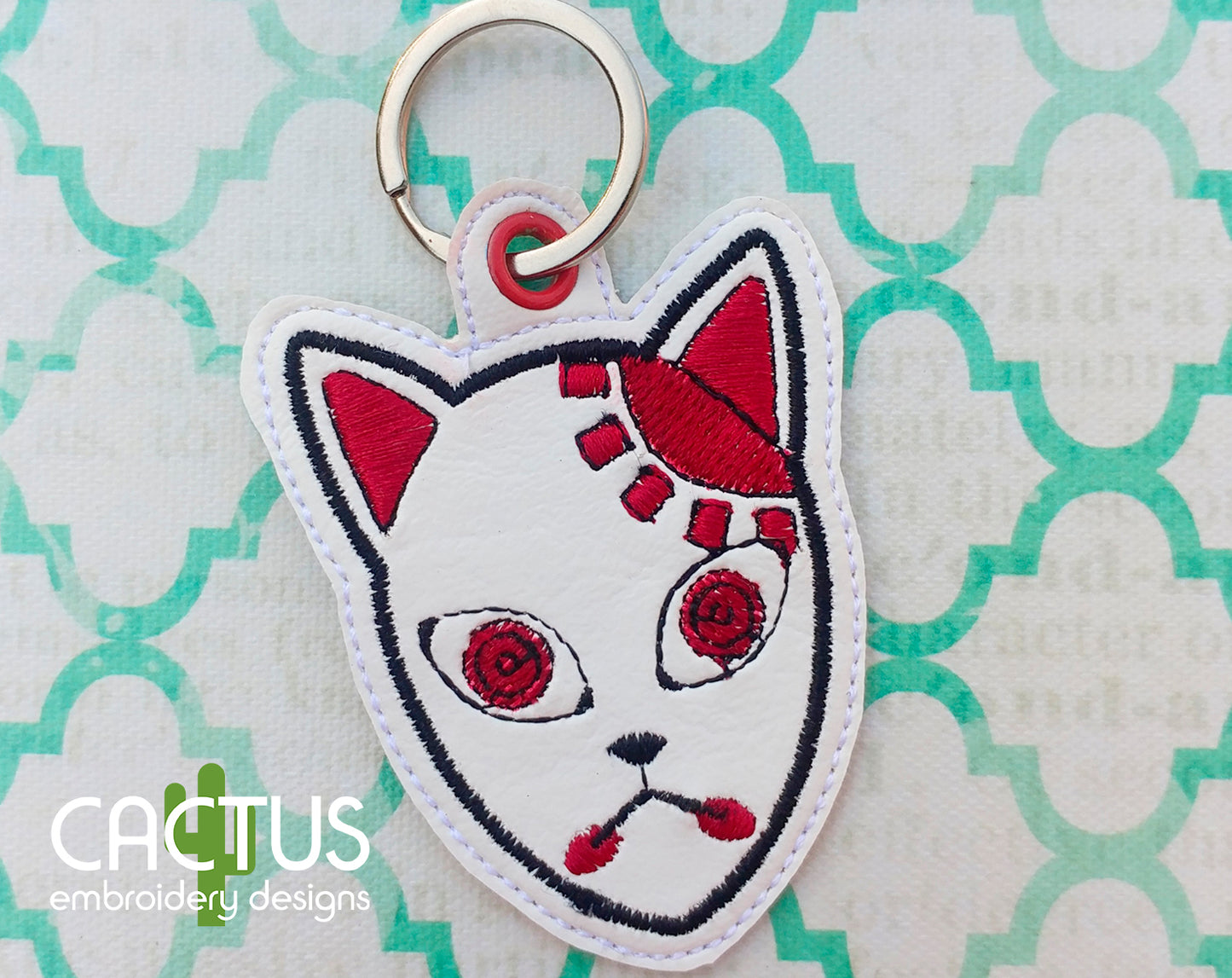 T Mask Snap Tab & Eyelet Fob