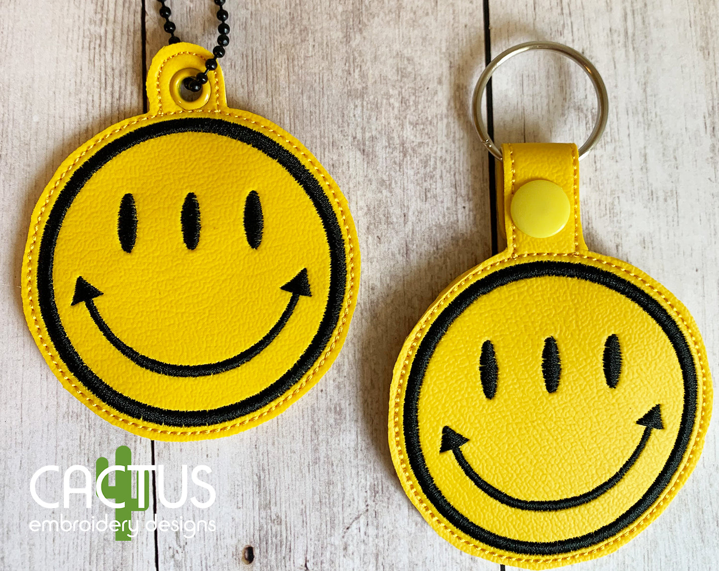 Transients Smiley Snap Tab & Eyelet Fob