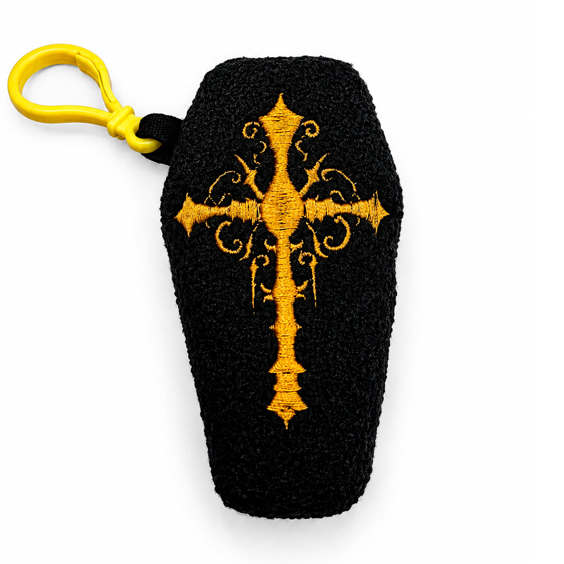 Coffin-shaped plushie with a cross in-the-hoop Halloween embroidery design