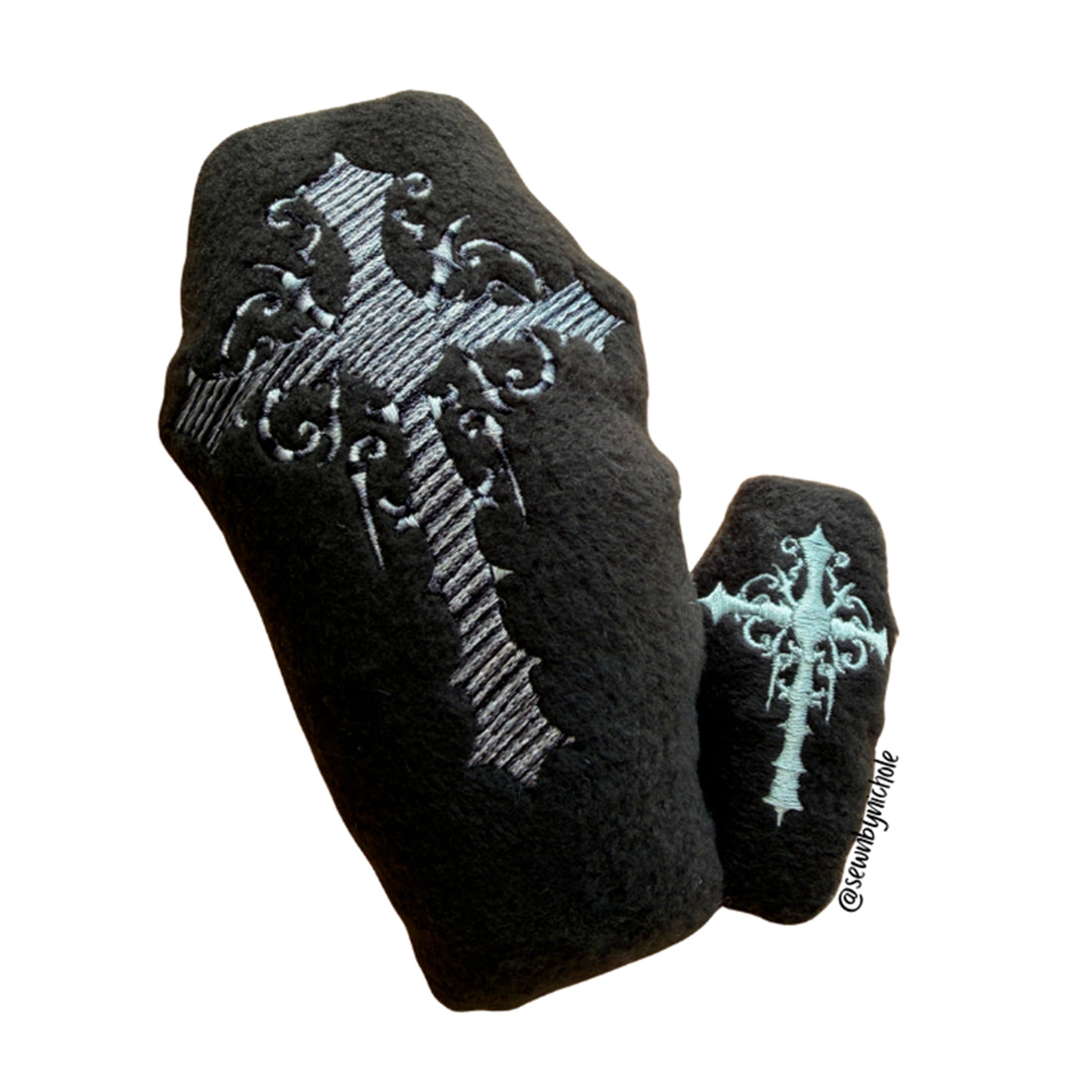 Coffin-shaped plushie with a cross in-the-hoop Halloween embroidery design