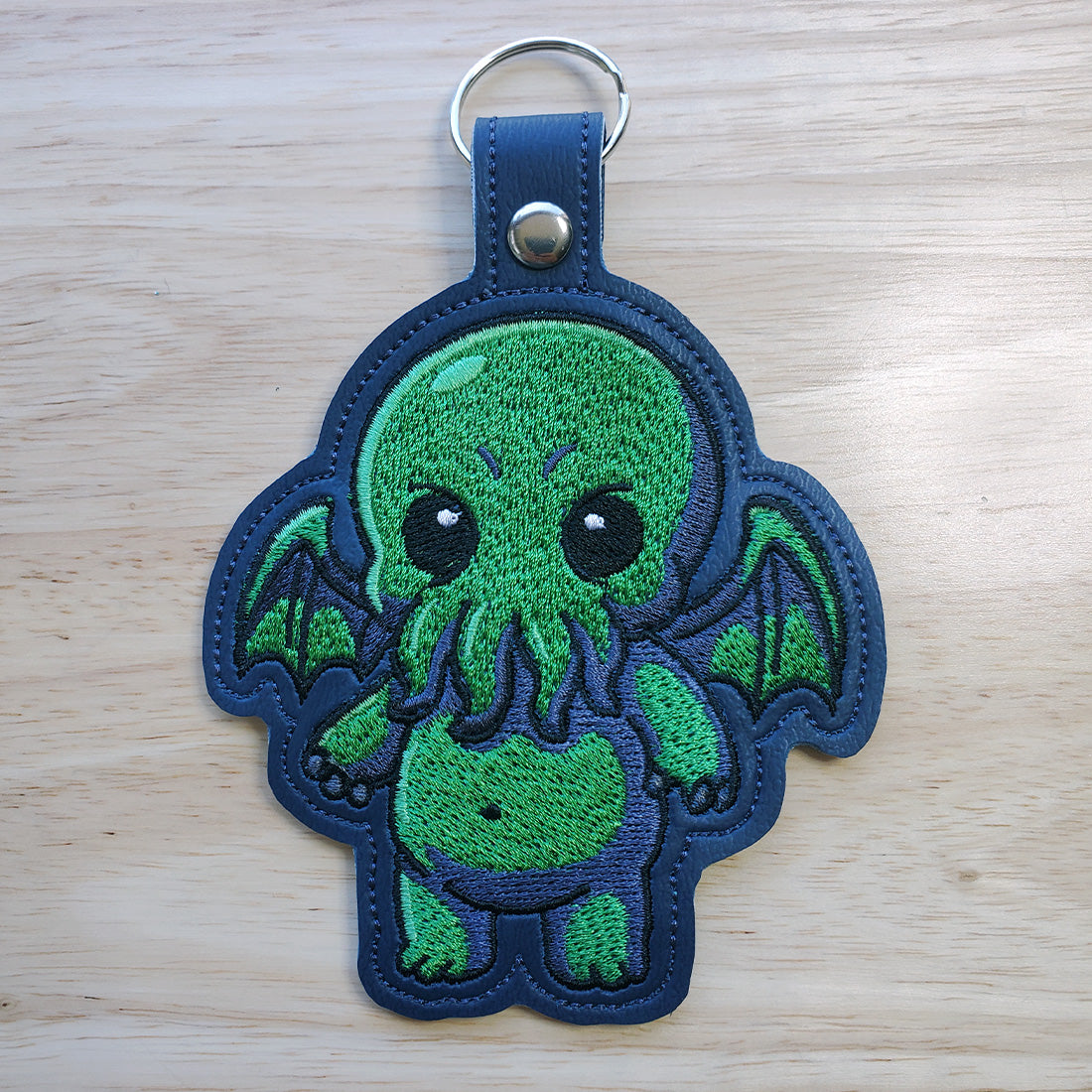 Entity Snap Tab & Eyelet Fob