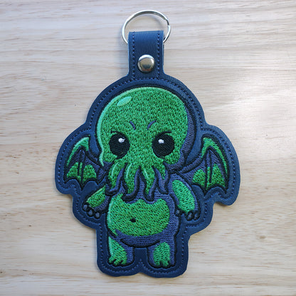 Entity Snap Tab & Eyelet Fob