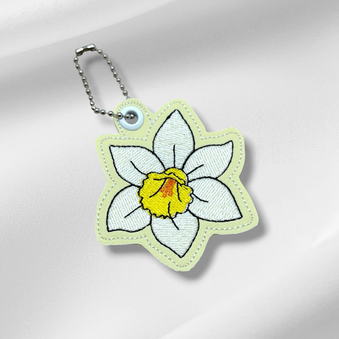 Daffodil Snap Tab & Eyelet Fob