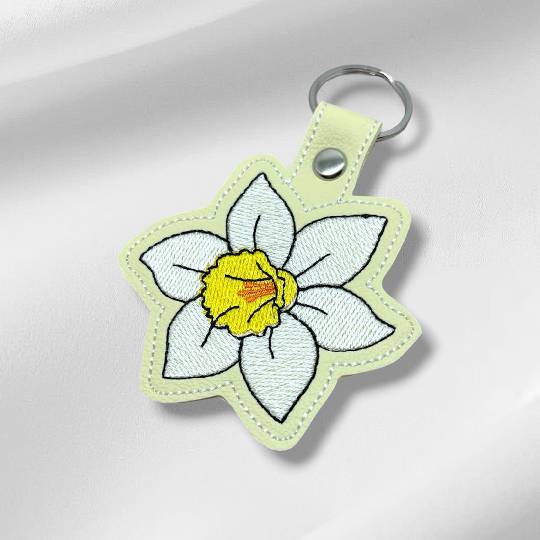 Daffodil Snap Tab & Eyelet Fob