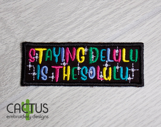 Delulu Patch Embroidery Design & Eyelet Fob