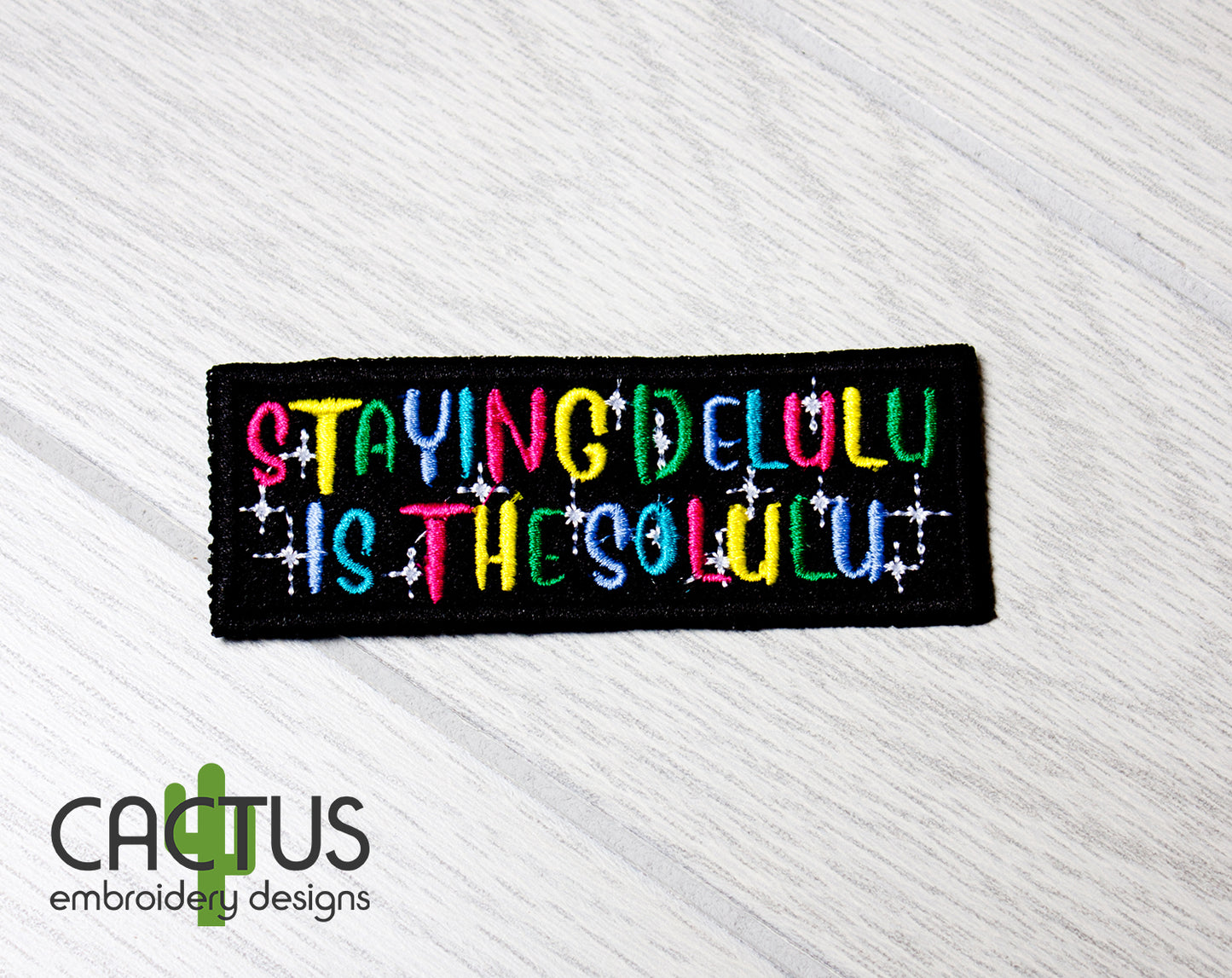 Delulu Patch Embroidery Design & Eyelet Fob