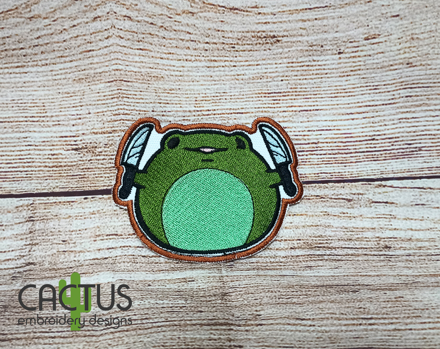 Froge with a Knife Patch Embroidery Design