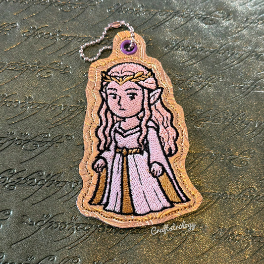 Lady of the Wood Snap Tab & Eyelet Fob