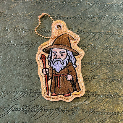 The Grey Wanderer Snap Tab & Eyelet Fob