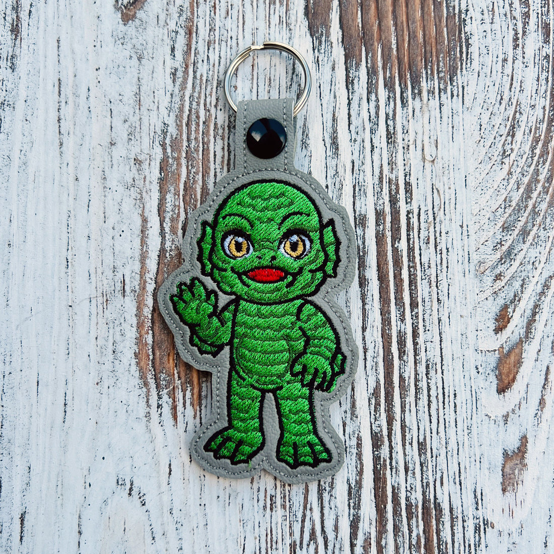 Gill-Man Snap Tab & Eyelet Fob