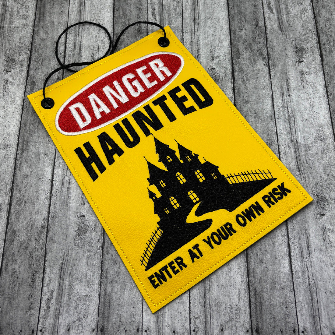 Haunted castle door sign embroidery design, Halloween warning sign reading danger enter at your own risk