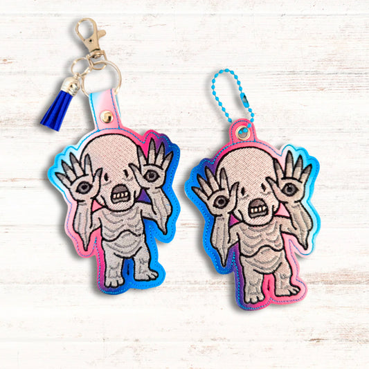 Pale Man Snap Tab & Eyelet Fob