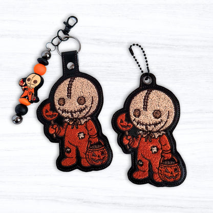 Sackhead Halloween Creature snap tab and eyelet fob machine embroidery design