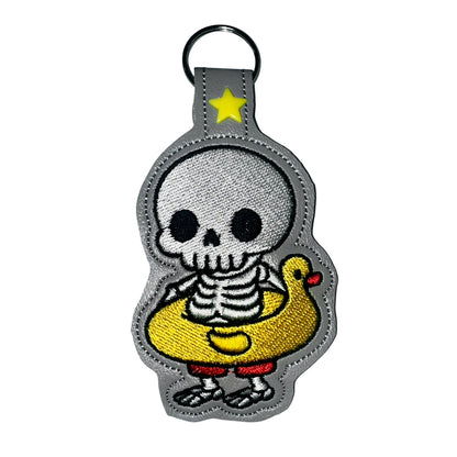 Skeleton in a duck lifebuoy Snap Tab & Eyelet Fob