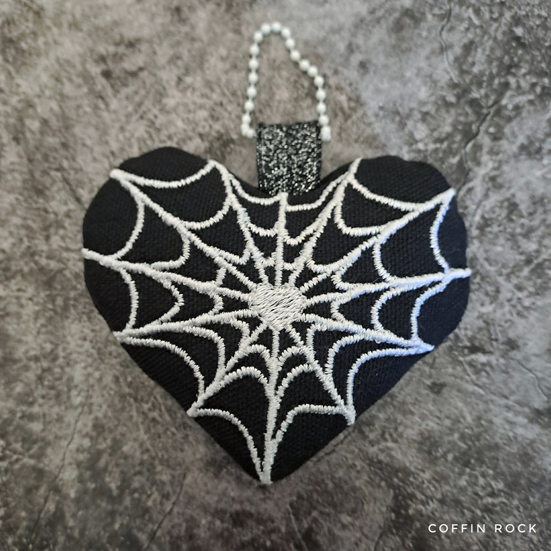 Spiderweb heart plushie Halloween ITH embroidery design, creepy-cute heart plush with spiderweb detail