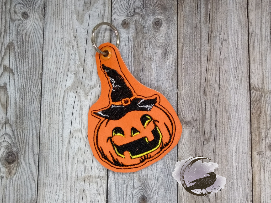 Pumpkin in Hat Eyelet Fob & Snap Tab