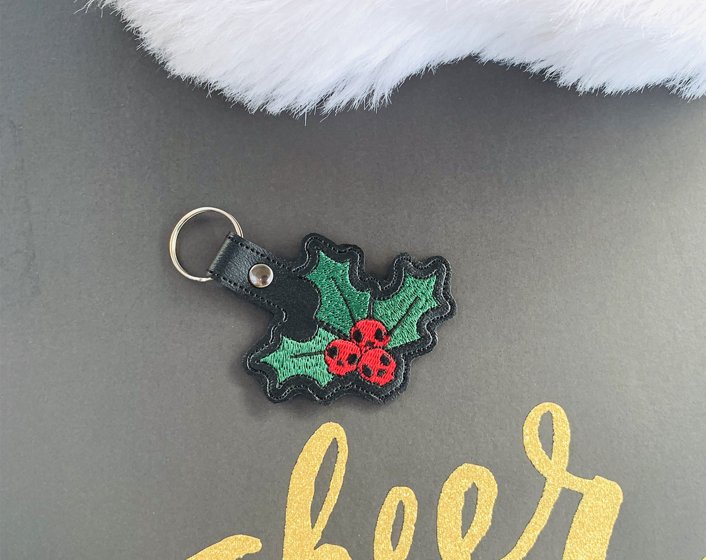 Christmas Holly Skulls Snap Tab & Eyelet Fob