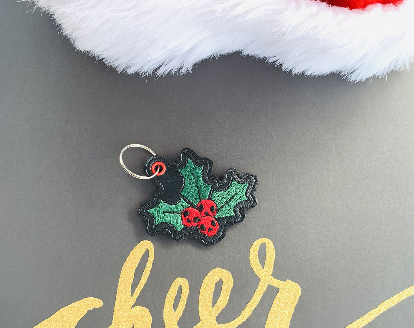 Christmas Holly Skulls Snap Tab & Eyelet Fob