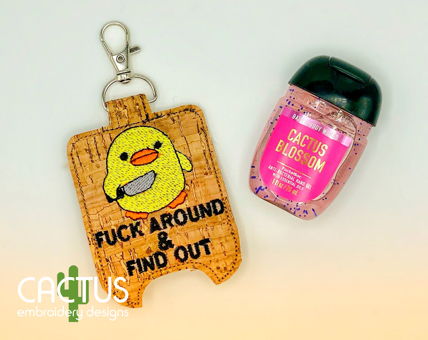 Find Out Eyelet Fob, Snap Tab & Sanitizer Holder