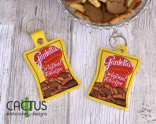 G Snack Mix Snap Tab & Eyelet Fob