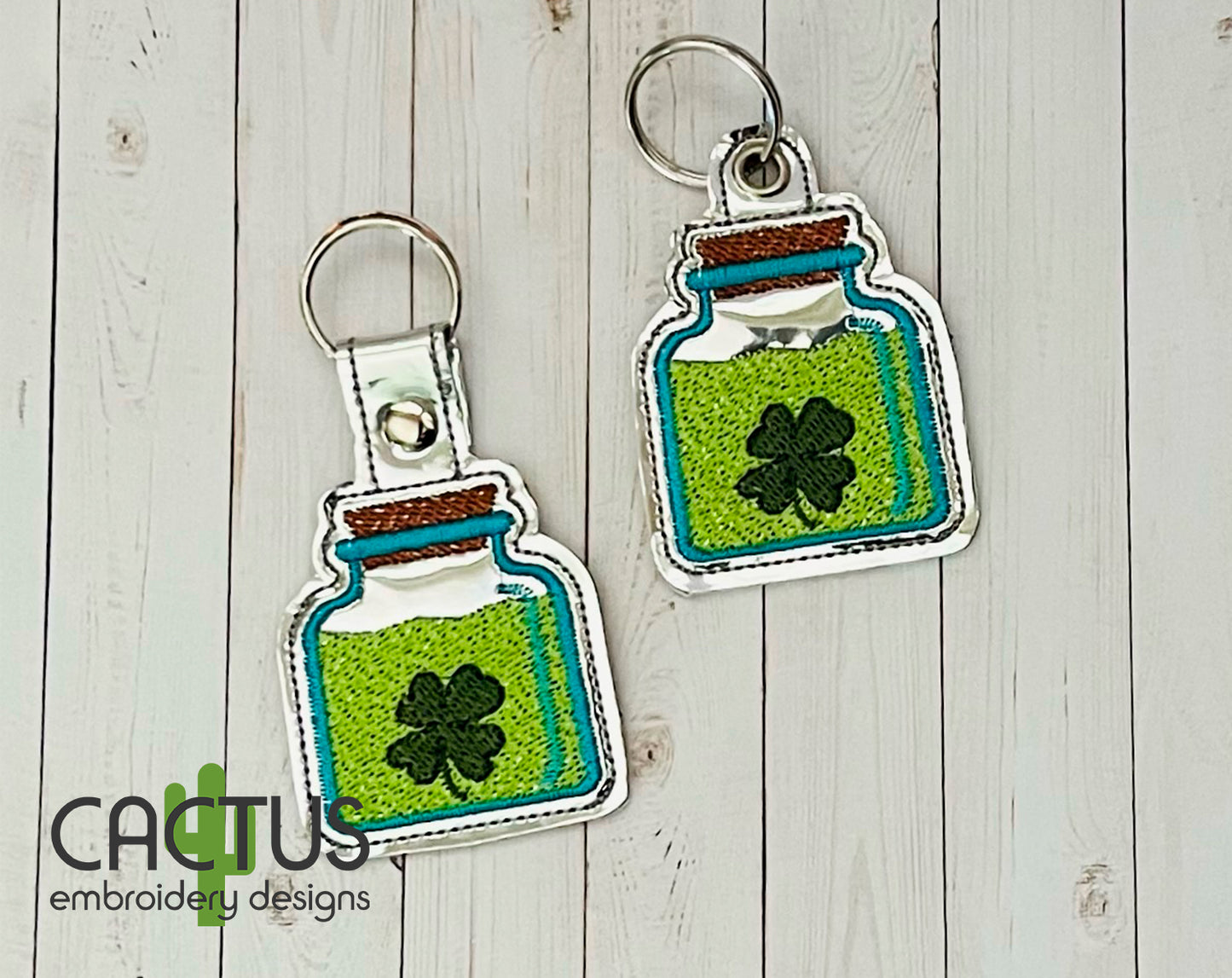 Liquid Luck Snap Tab & Eyelet Fob